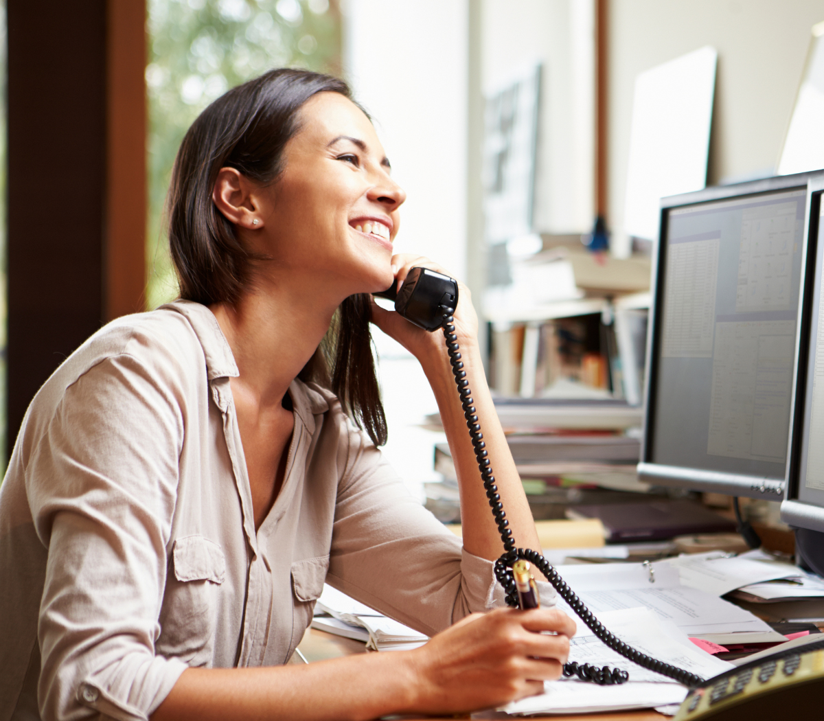 woman talking on small business phone