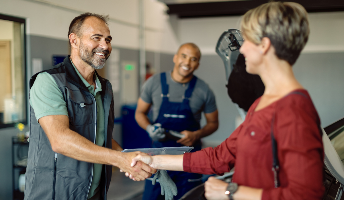 automotive customer shaking hands